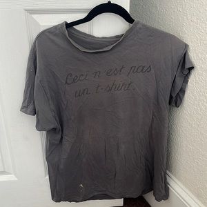 Used/old shirt, grey, French brand Ceci n’est pas un t-shirt this is not a shirt